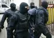 Percheziții la persoane bănuite de tâlhărie calificată