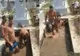 VIDEO Piscină în cimitir: trei gropari au umplut mormântul cu apă și s-au bălăcit 